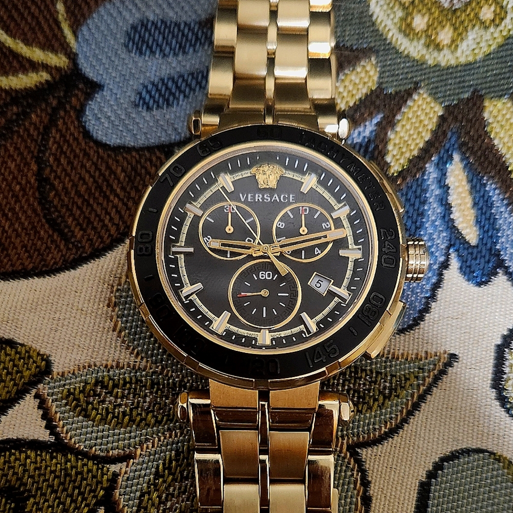 Gold versace watch polished and cleaned.Does not come with extra links